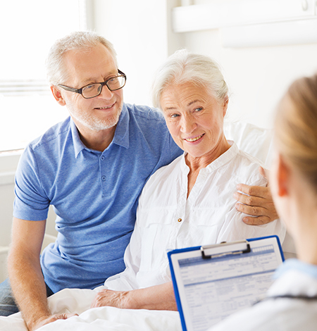 Elderly Couple in Doctor's Office